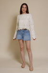 Storia cropped pointelle sweater with scalloped edges, in cream.