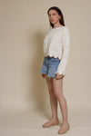 Storia cropped pointelle sweater with scalloped edges, in cream.