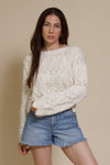 Storia cropped pointelle sweater with scalloped edges, in cream.