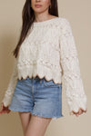 Storia cropped pointelle sweater with scalloped edges, in cream.