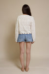 Storia cropped pointelle sweater with scalloped edges, in cream.