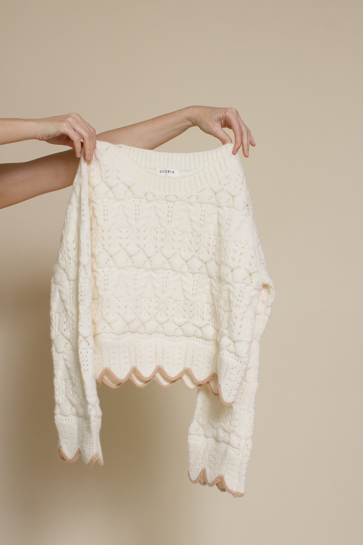 Storia cropped pointelle sweater with scalloped edges, in cream.