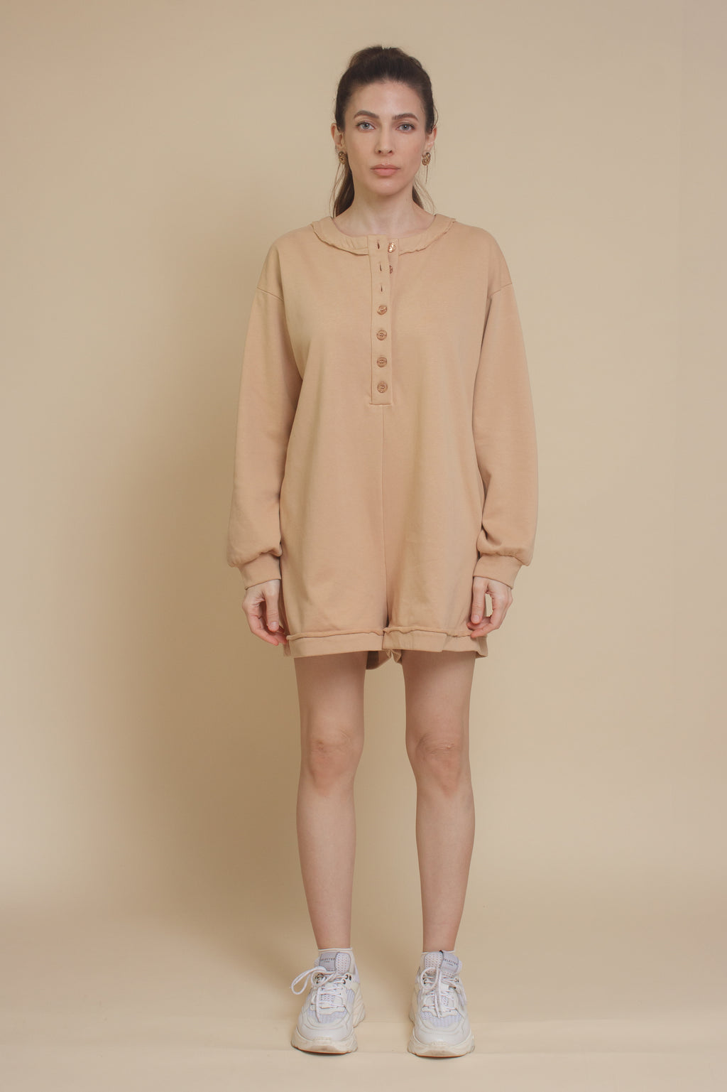 Henley style sweatshirt romper, in tan.