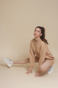 Henley style french terry romper, in tan.