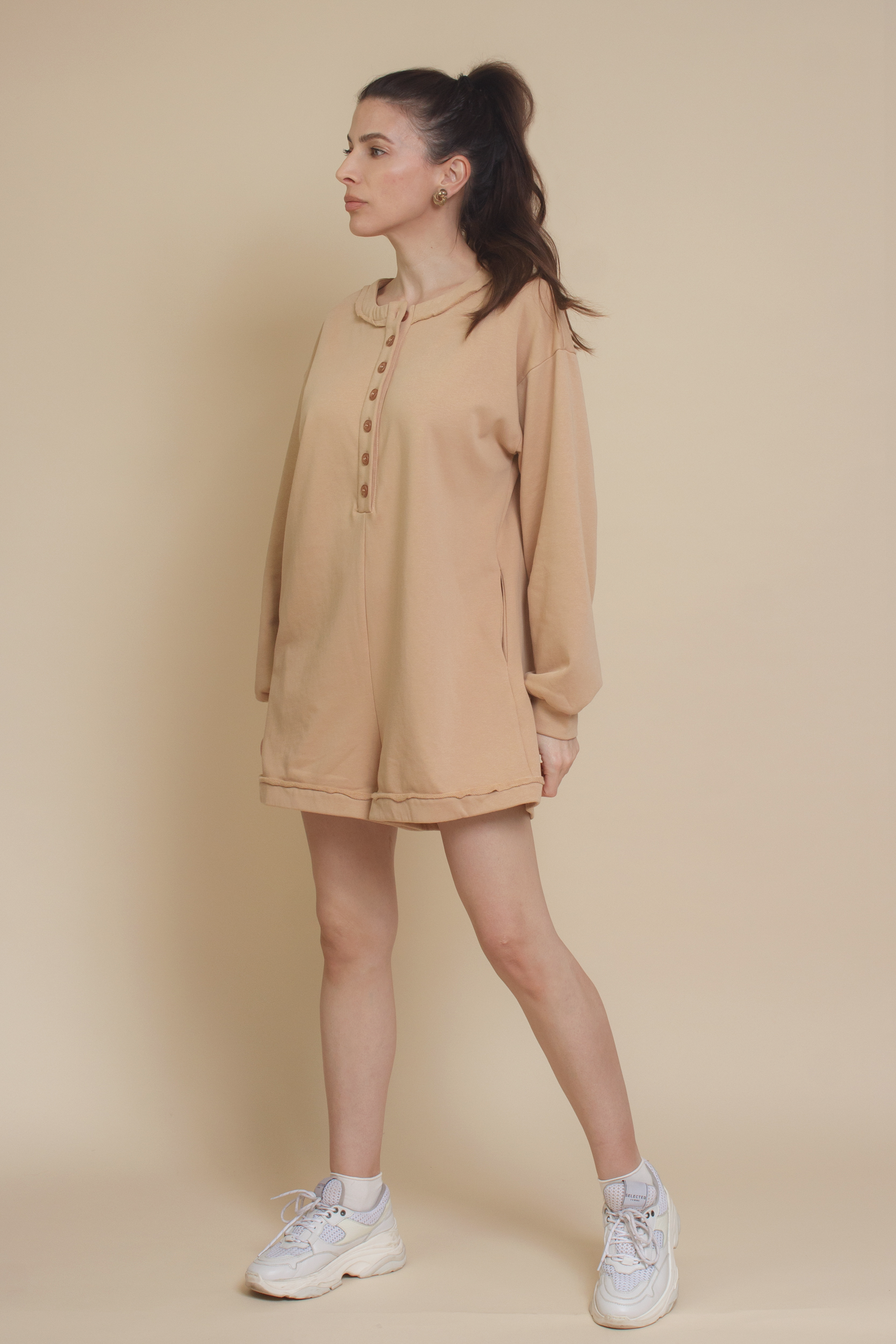 Henley style french terry romper, in tan.