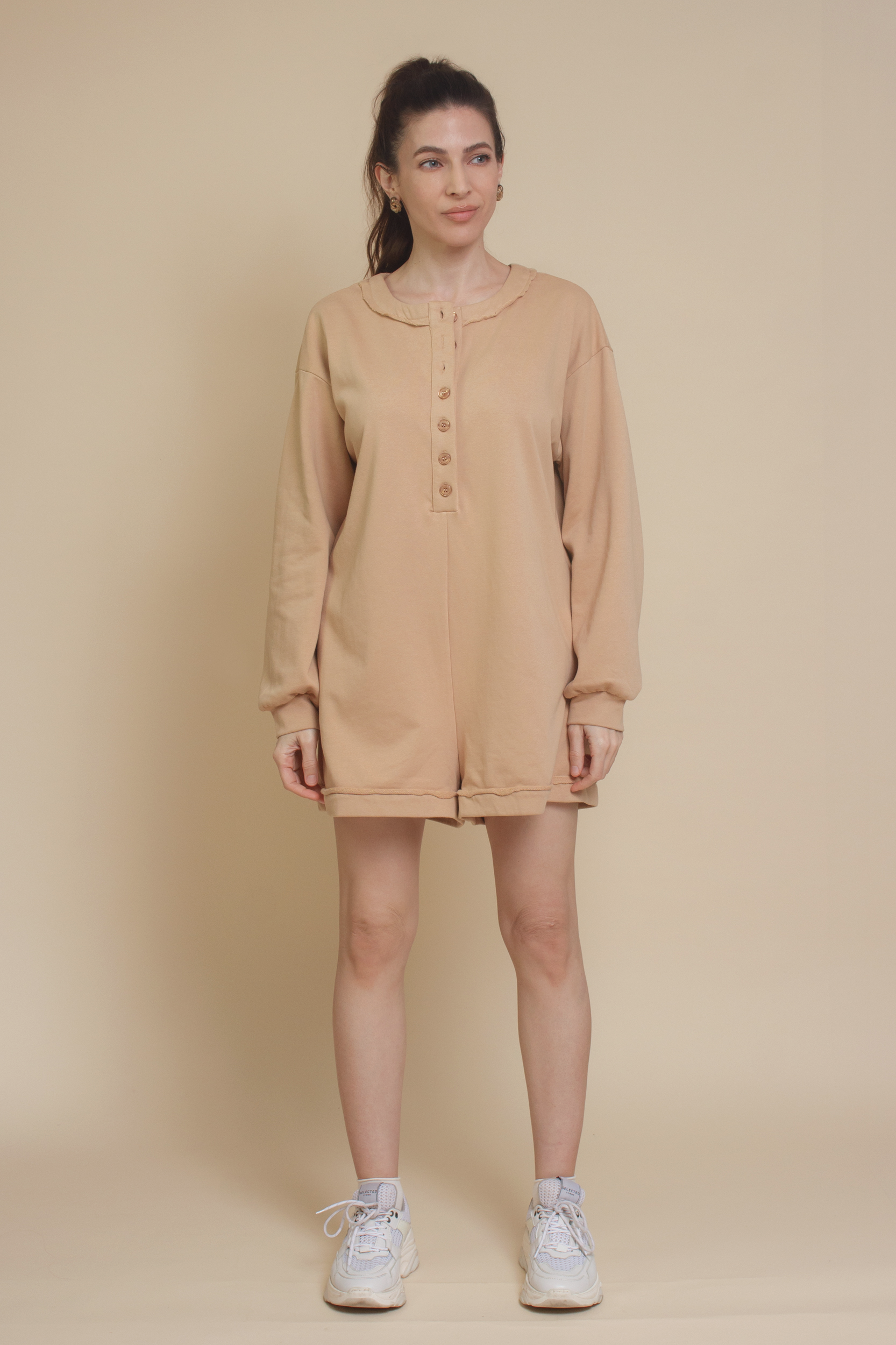 Henley style french terry romper, in tan.