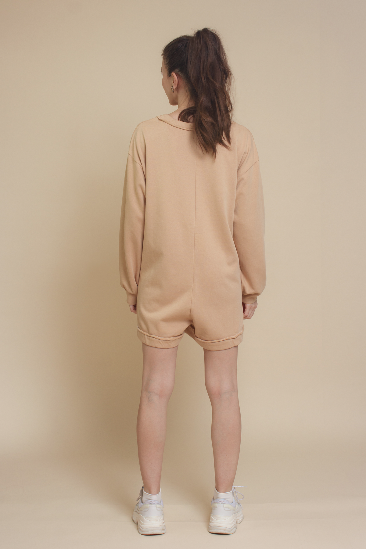 Henley style french terry romper, in tan.