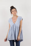 Babydoll style tee shirt, in light blue.