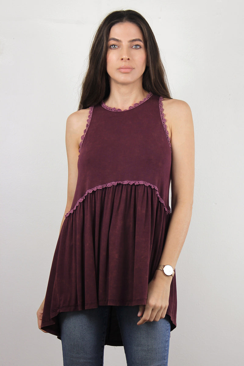 Babydoll style top, with exposed back zipper, in burgundy.