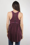 Babydoll style top, with exposed back zipper, in burgundy.