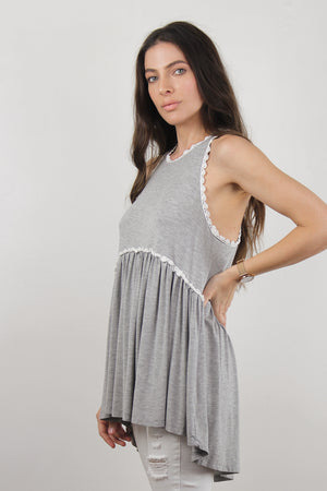 Babydoll style top, with exposed back zipper, in heather grey. Image 3