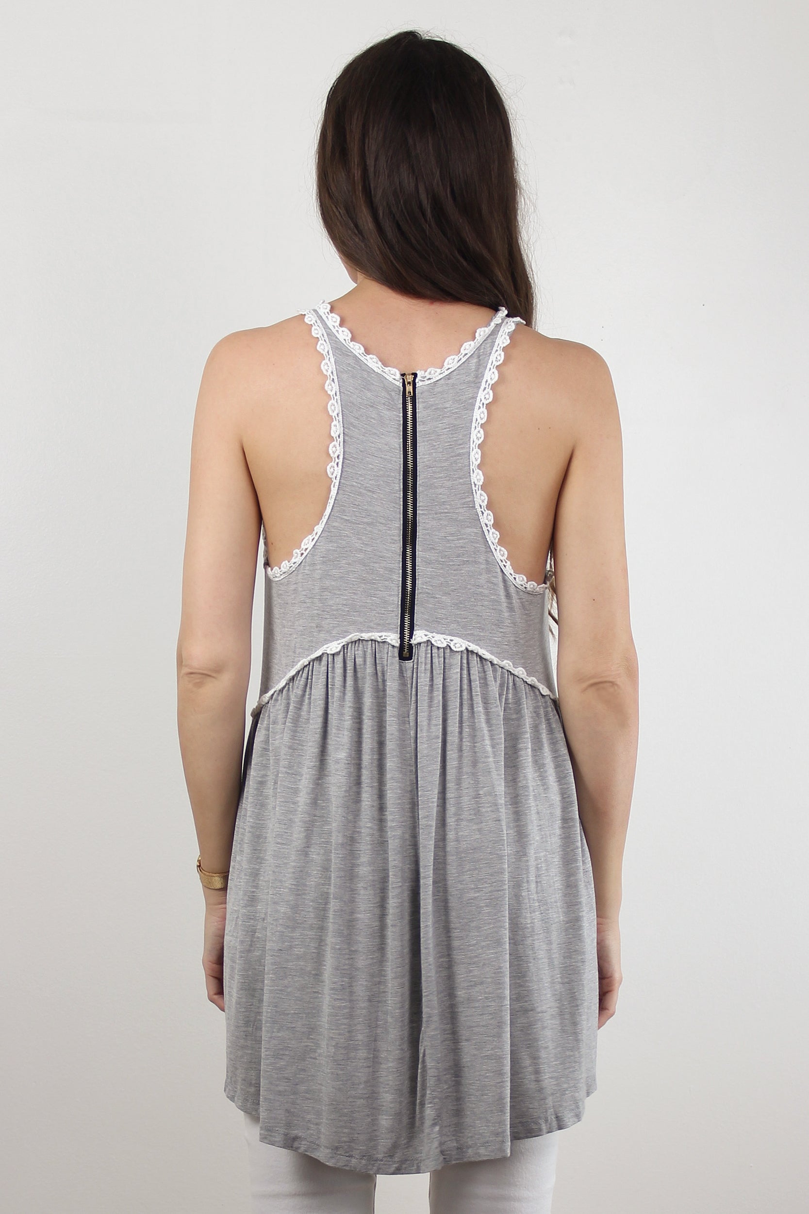 Babydoll style top, with exposed back zipper, in heather grey.