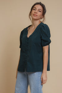 Corduroy button front blouse with puff sleeves, in teal.