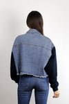 Cropped denim jacket with sweatshirt style sleeves. Image 4