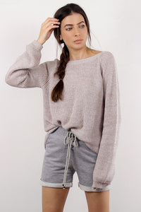 Slouchy sweater with criss cross back, in sand.