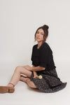 Ditsy floral print midi skirt with lace contrast detail, in black. Image 16