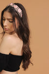 Floral embroidered knot top headband, in brown/pink. Image 2