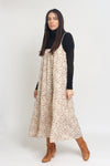 Apron front floral midi dress with pockets and tiered skirt, in cream.