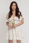 Floral mini dress, with flutter sleeves, in pink cream. Image 10
