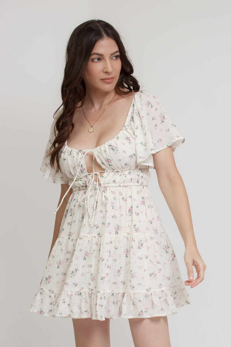 Floral mini dress, with flutter sleeves, in pink cream. Image 6