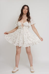 Floral mini dress with flutter sleeves, in pink cream.
