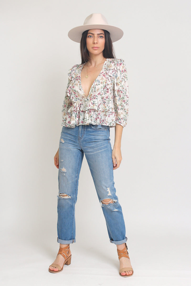 Floral top with ruffle detail and puff sleeves, in White.