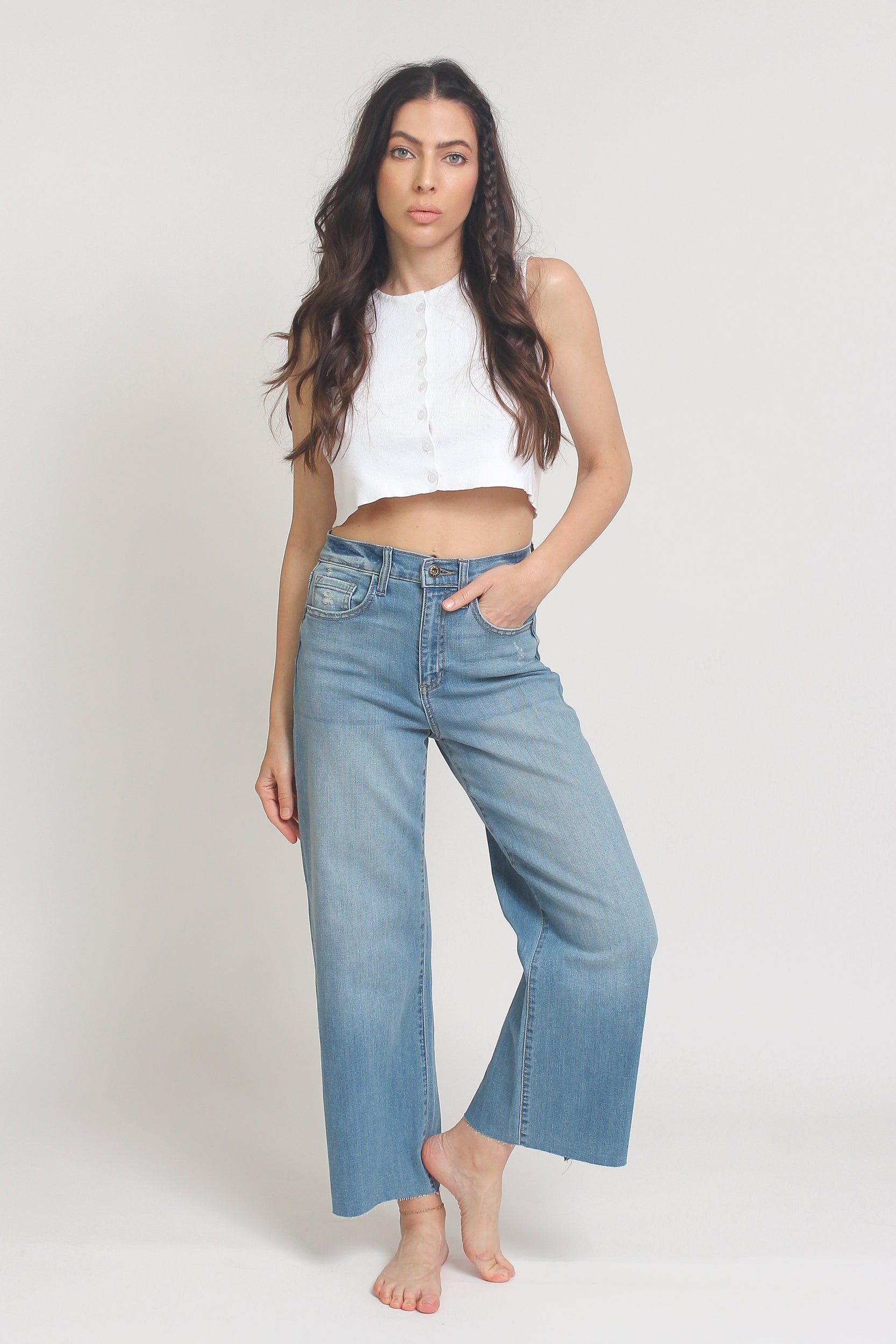 High waist, cut off cropped jeans, in Med/Light. Image 2