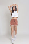 Lace up terry cloth shorts, in Copper. Image 4