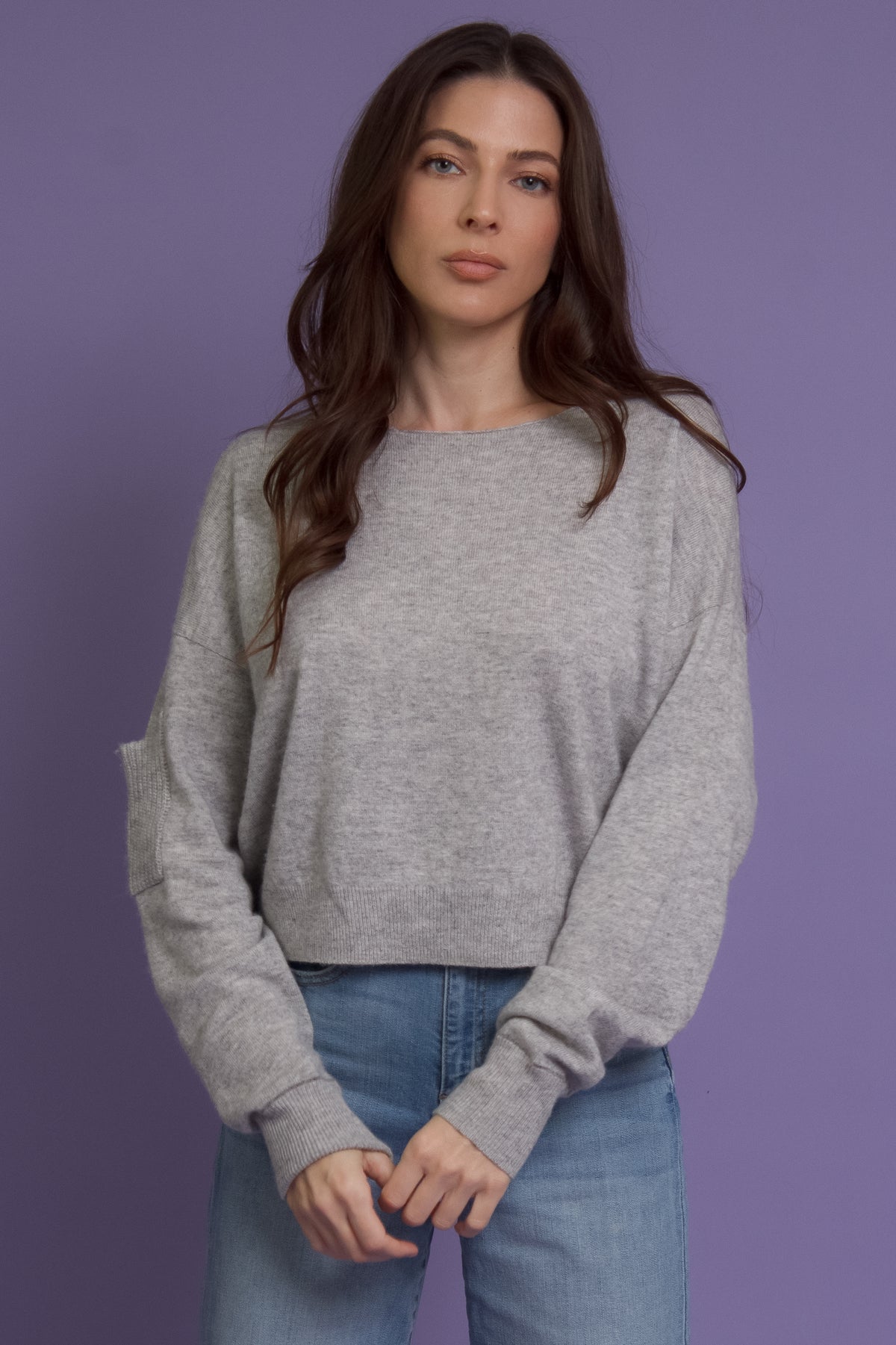 Cashmere blend sweater with sleeve pocket.