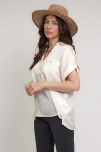 Silk henley blouse with rolled sleeves, in cream. Image 3
