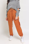Silk joggers with drawstring waist, in caramel. Image 7