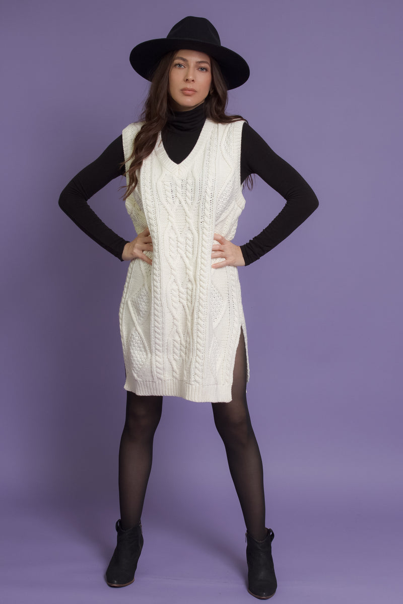 Cable knit sweater dress with velvet ties, in ivory.