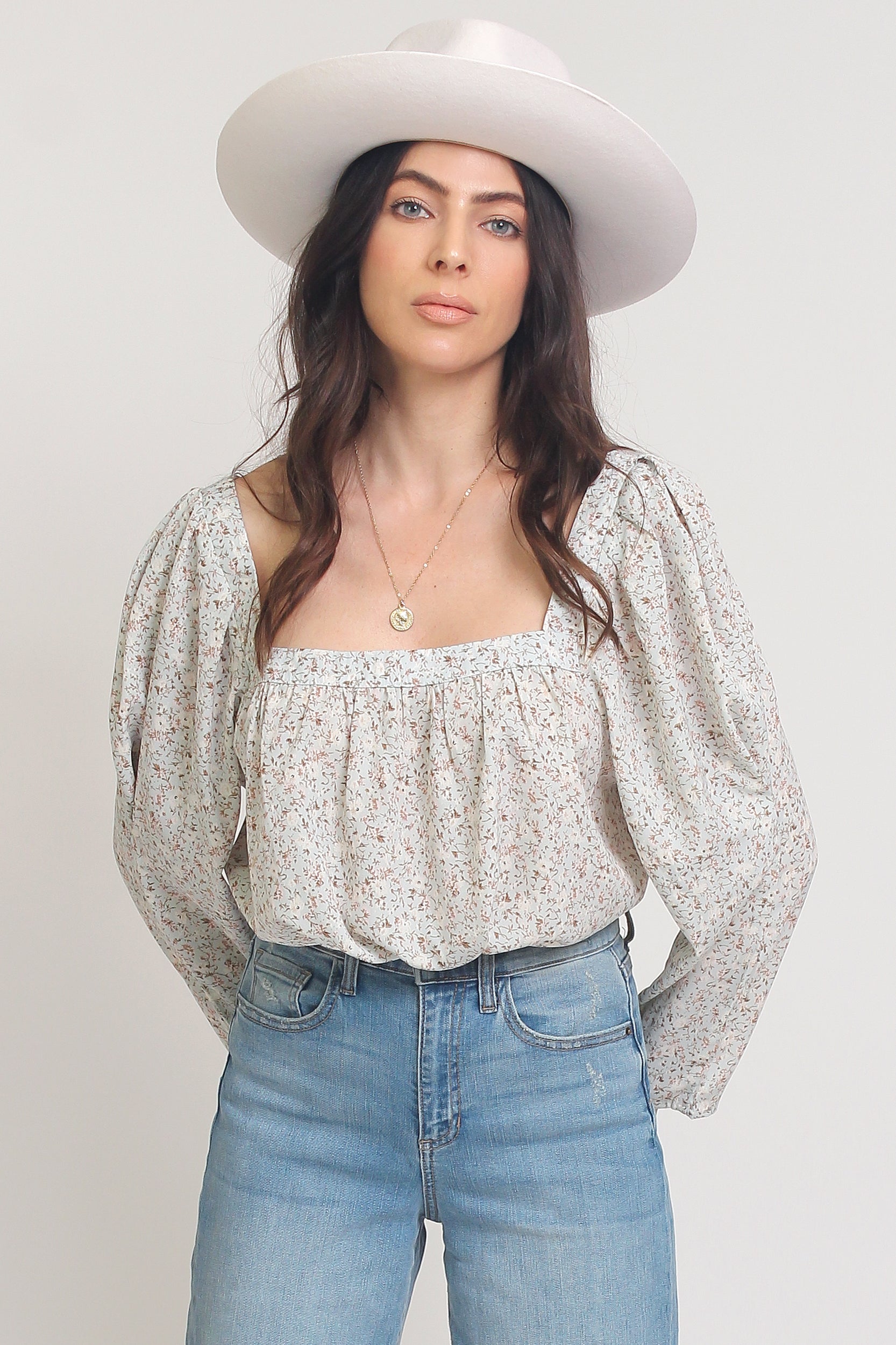 Floral top with square neckline and puff sleeves, in Pale Sage. Image 14