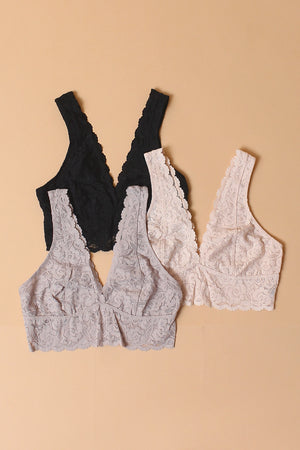 Lace bralette with v-cut neckline in front and back. Flatlay