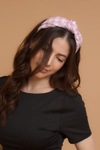 Woven straw headband with knot top, in lilac. Image 2