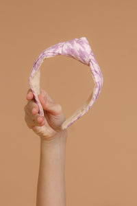 Woven straw headband with knot top, in lilac. Image 9